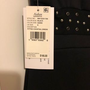 Very cute little black dress with interesting back